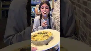 Mom and me trying escargot 