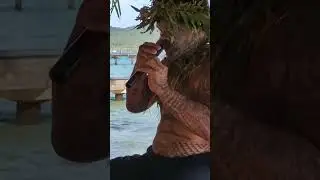 Playing a nose flute in Le Tahaa resort