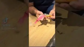 Mister Fish demonstrates a system designed to reel in fish, even when live bait isn't available.