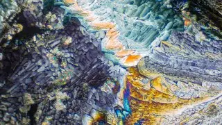 Crystals Forming Under Polarized Light - Scientific Art Time Lapse