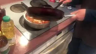 Adding bacon and greens into meat mixture