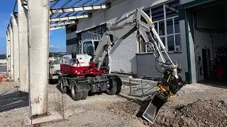 Construction of a steel hall and Takeuchi TB 295 W