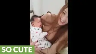 Asian baby speaks English for the fist time