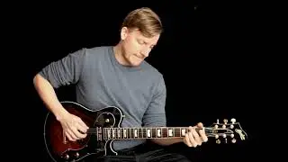 Playing a Leaper Junior Baum guitar