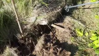 Scrap metal search! Rack jack! The plate is lifted, has got tracks!