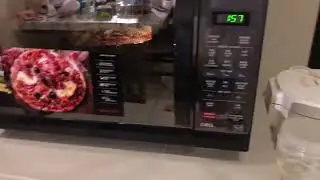 How to cook/reheat  pizza in sharp microwave oven #shorts #pizza #microwaveoven #sharp #julies