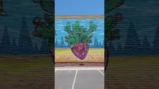 Near the Loft Cinema you can find the Desert Heart mural by Phoenix artist Lalo Cota.
