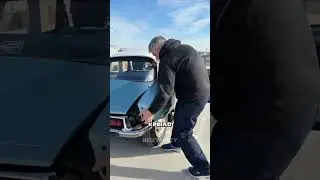 Changing a wheel on an old Citroen 