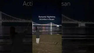 Romantic nighttime activity on Gwangalli beach, Busan.