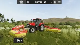 Скашиваю траву на поляне в игре farming simulator20