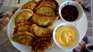 Empanadas is a crispy snack with juicy meat filling. Spanish mini pasties