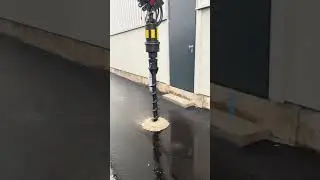 DIGGA RC Auger drills through asphalt.