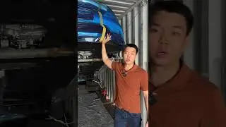 Процесс погрузки автомобилей в контейнер