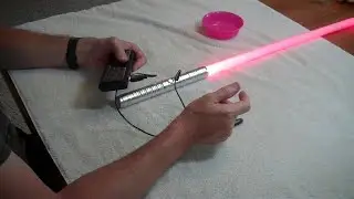 HOWTO: Open and fix a toy light-saber that refuses to charge - works when charging cable powered