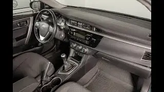 Removing the front panel of a Toyota Corolla E160/E170