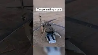 Pilotless Black Hawk with a split-open, cargo eating nose