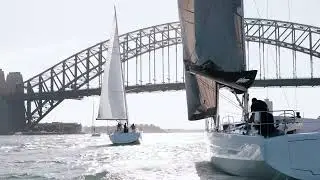 Sunlit decks of the Elan E6 and Elan Impression 43 at Sydney Bay