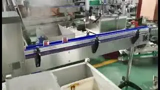 How is the heat shrinkable film on the cans put on?