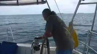 Operating Monet II - unfurling the jib