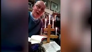 Vicar accidentally sets himself on fire during online sermon.