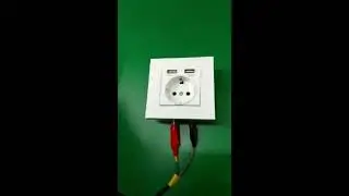 Розетка с выходом USB для зарядки телефона.
