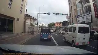 Bus blasting through the red traffic light