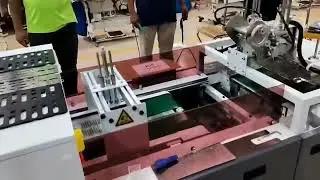 Indonesia garment factory running portable clothes automatic folding & bagging machine 印尼工厂包装机使用现场