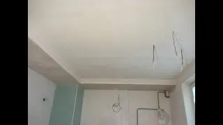 Continuous plastering of the ceiling with installation of fiberglass mesh in the kitchen