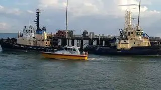 Pilot boat Lamaroo leaves Fort Hill Wharf Darwin NT Australia