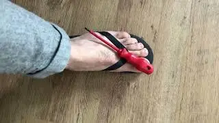 How to put a screwdriver on your foot #shorts #trending #asmr