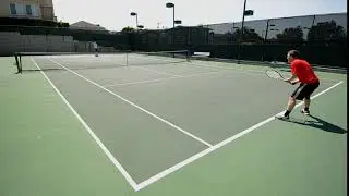a man serving an ace tennis serve to his opponent 2P5YXVE