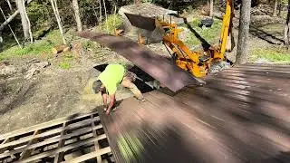 Putting up a roof at Full Creek Farms