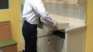 Removing a soft-close drawer box from our cabinetry (Blum Undermount drawer slide)