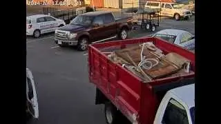 Security Camera Catches Parking Lot Incident (Zoom)