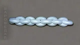 Weaving anchor chain of balloons.