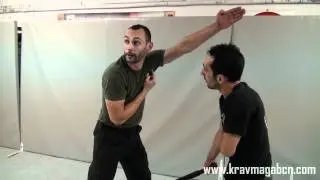 Downward stick attack Defense - Krav Maga Worldwide Barcelona - Andres Bravo