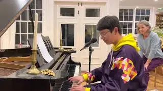 Thomas plays his own PianoEasy Blues