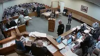 He lights up a joint during his trial for possession of marijuana.