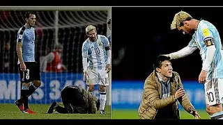 Lionel Messi abraza a un aficionado durante el Argentina vs Uruguay 1-0