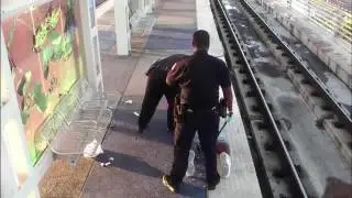 POLICE BRUTALITY - Psycho Houston Cops Caught Beating Homeless Man At Rail Station