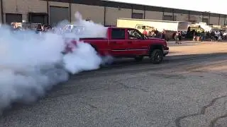 Cars leaving car show BURNOUTS