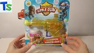 Unpacking toys for bubbles.Gun soap bubbles.