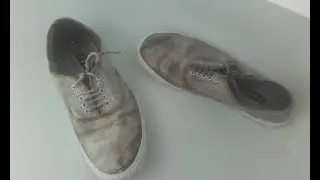 Dirty plimsolls having a wash
