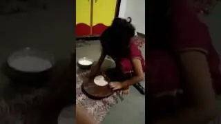 5year old child making round roti