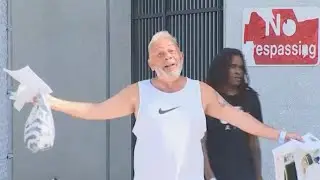 Prison-costumed protester speaks after arrest at Trump's indictment hearing near Miami courthouse