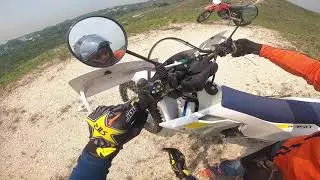 Arnie is on his  HUSKY FE 350 and I am on my  Honda XR250Y. scaling small hills