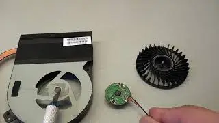 How to disassemble a non-separable laptop cooler and lubricate it to reduce noise.
