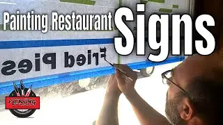 Painting the new signs for the Triple G Cafe