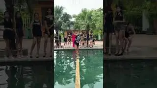Hải Yến - The catwalk challenge on a wooden beam over the swimming pool.