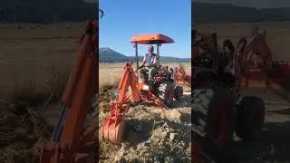 Kubota B2301 and BH70 Backhoe: Nice day to help out a buddy moving some dirt.